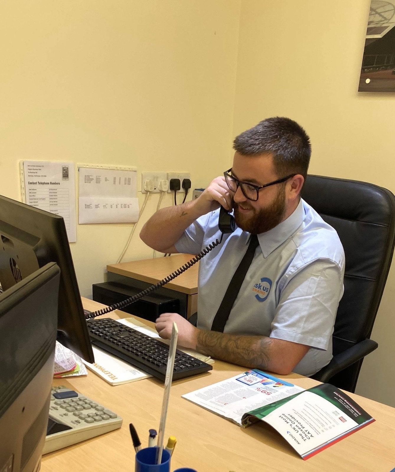 Clear Drains 4 U office team taking a customer call and booking a drainage visit